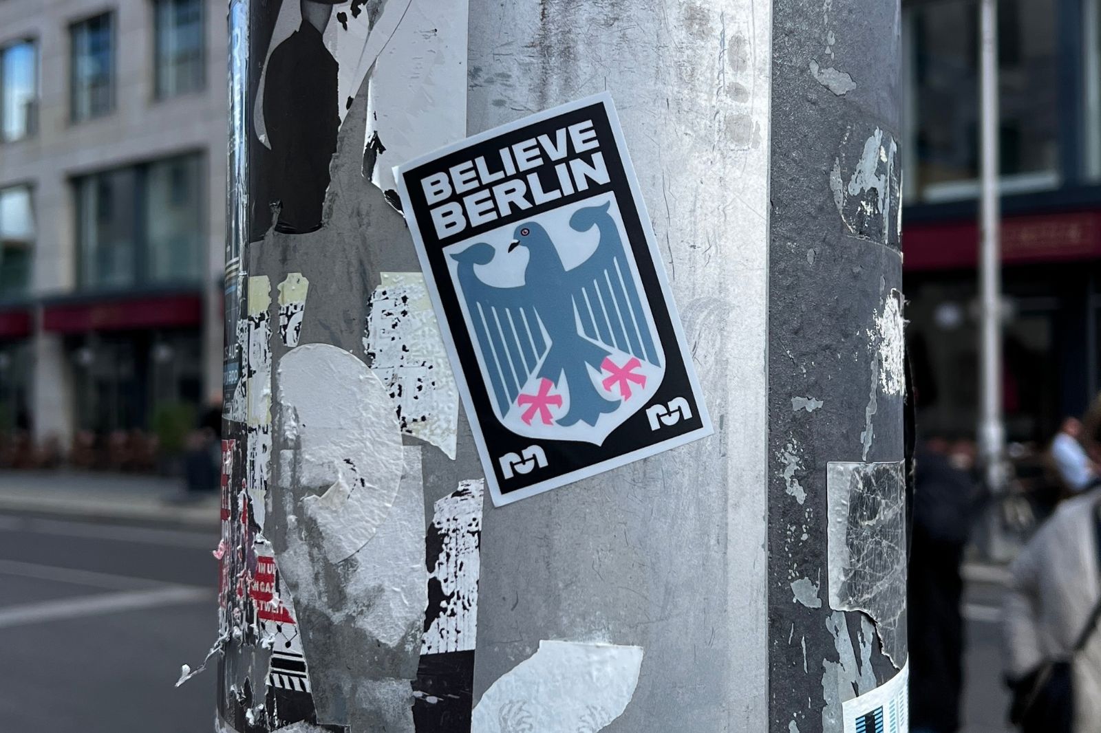 sticker on light post