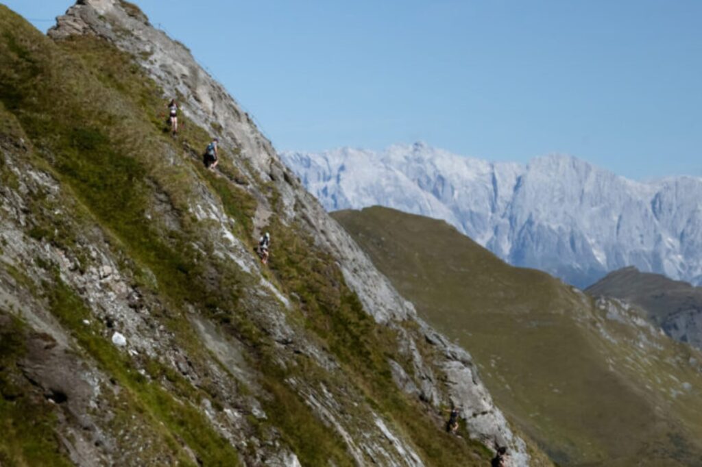 runners going up a mountain in austria