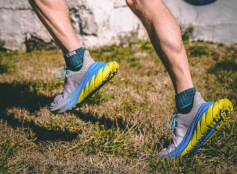 hoka shoe in grass