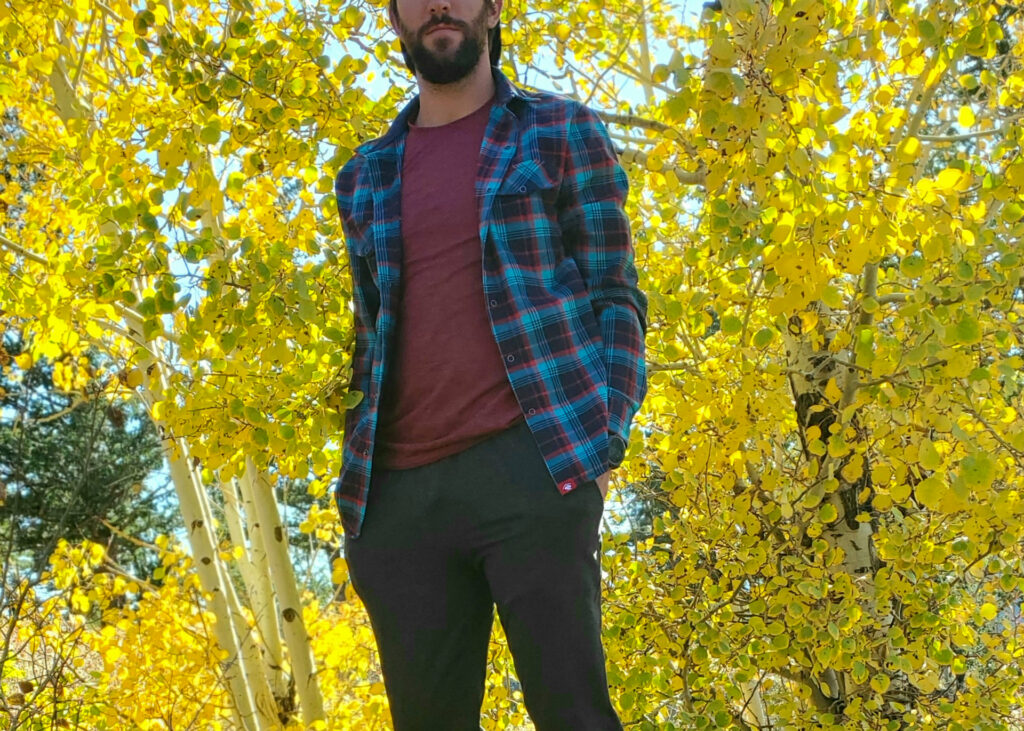 An image of the Rabbit Fall Casual EZ Tee LS in front of yellow leaves