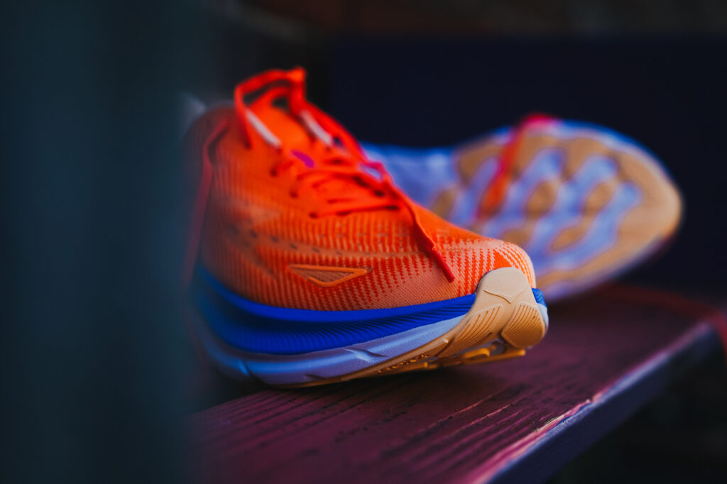 toe of an orange hoka clifton 9