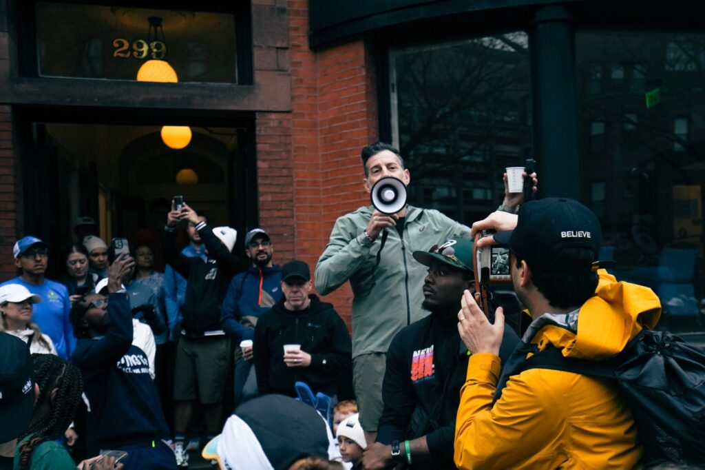 man talking into a megaphone