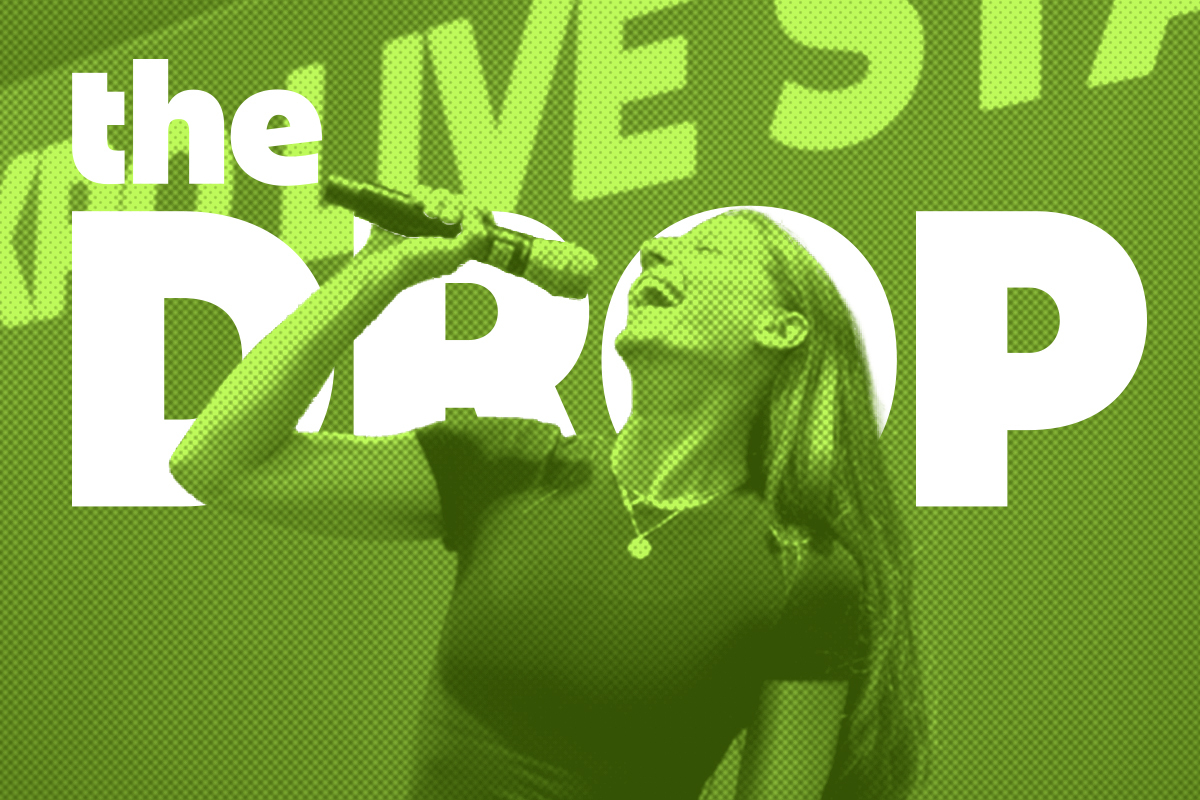 woman speaking into a microphone