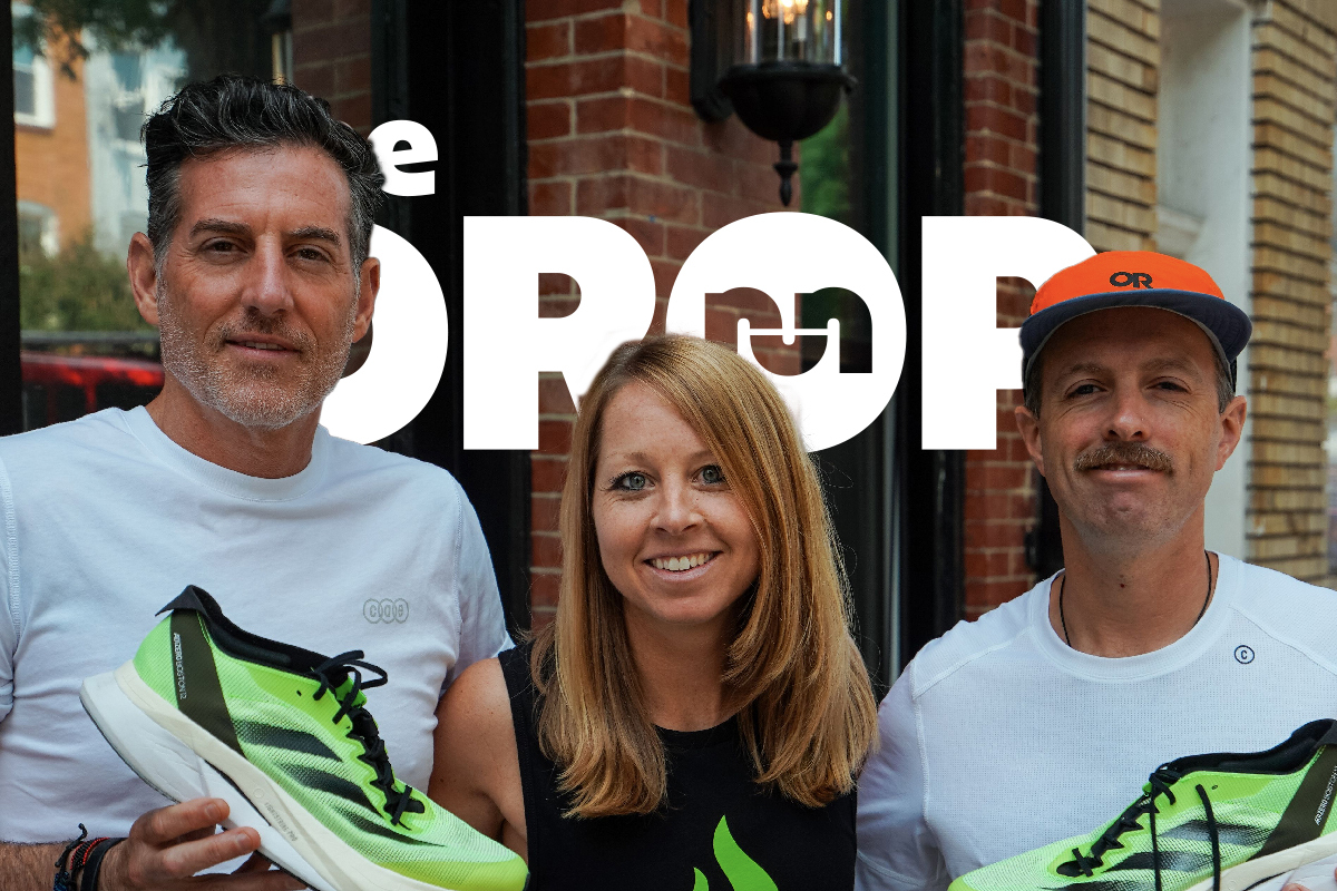 man in white shirt on left holding a neon yellow adidas running shoe, woman in center, man in white shirt on right holding a neon yellow adidas running shoe