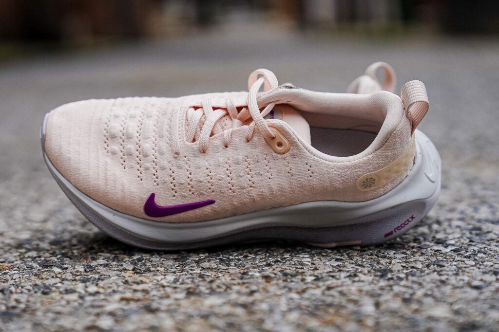 Nike air zoom flyknit pink purple.
