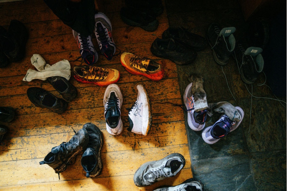 arcteryx event - shoes on floor