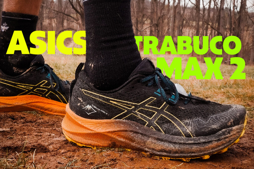 asics trabuco max 2 trail shoe n mud with words asics trabuco max 2 in background