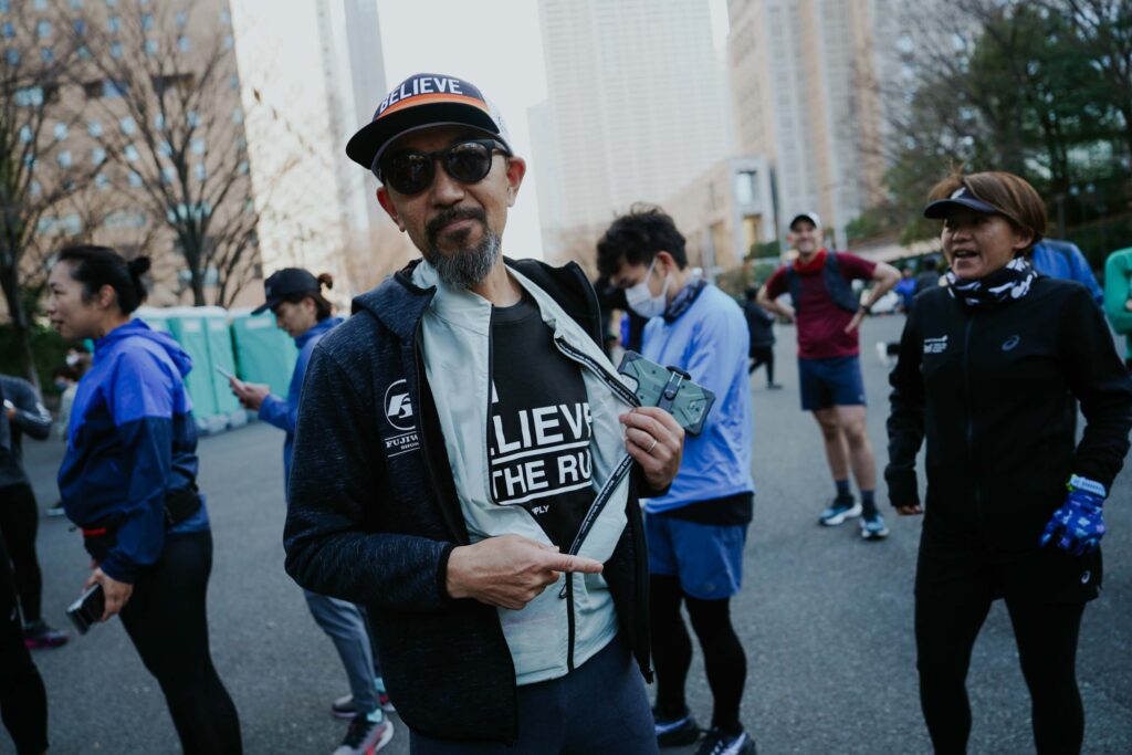 man with sunglasses in running clothes in japan