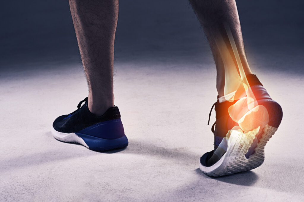 Cropped shot of a young man in the studio with cgi highlighting his ankle injury.
